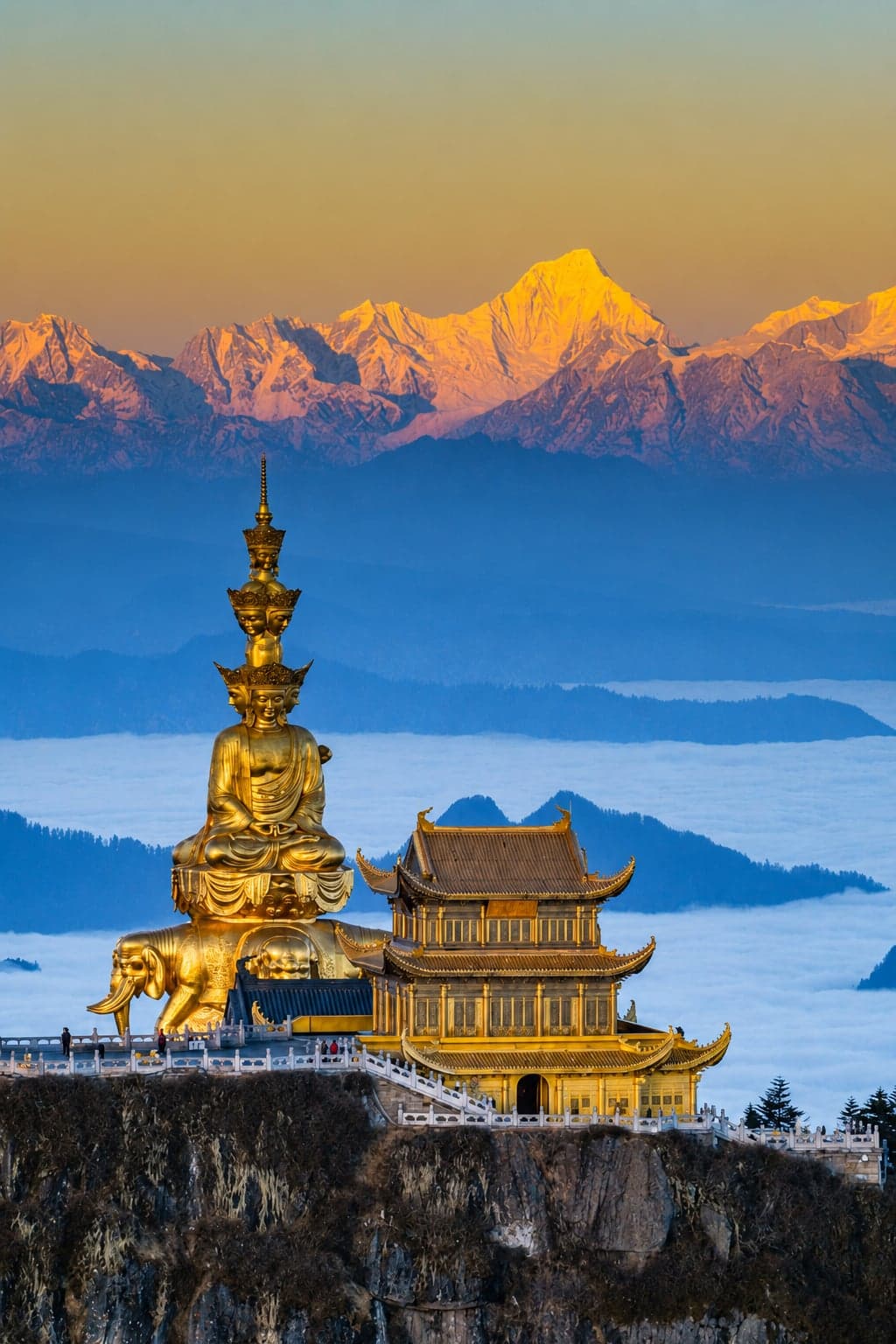 The Jinding Golden Summit of Mount Emei, the highest of China's four sacred Buddhist mountains, rising above a morning sea of clouds