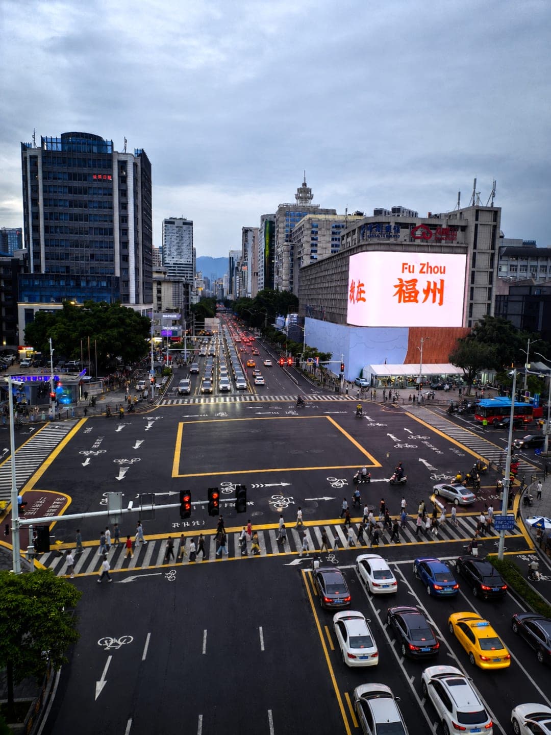 Aerial view of the Dongjiekou crossroads at the heart of old Fuzhou, with the Dongbai department store LED display on the eastern corner