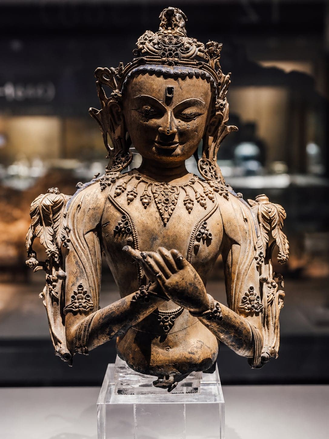 A polychrome Bodhisattva sculpture on display at the Hangzhou Museum on Liangdaoshan, from the Wuyue Buddhist collection