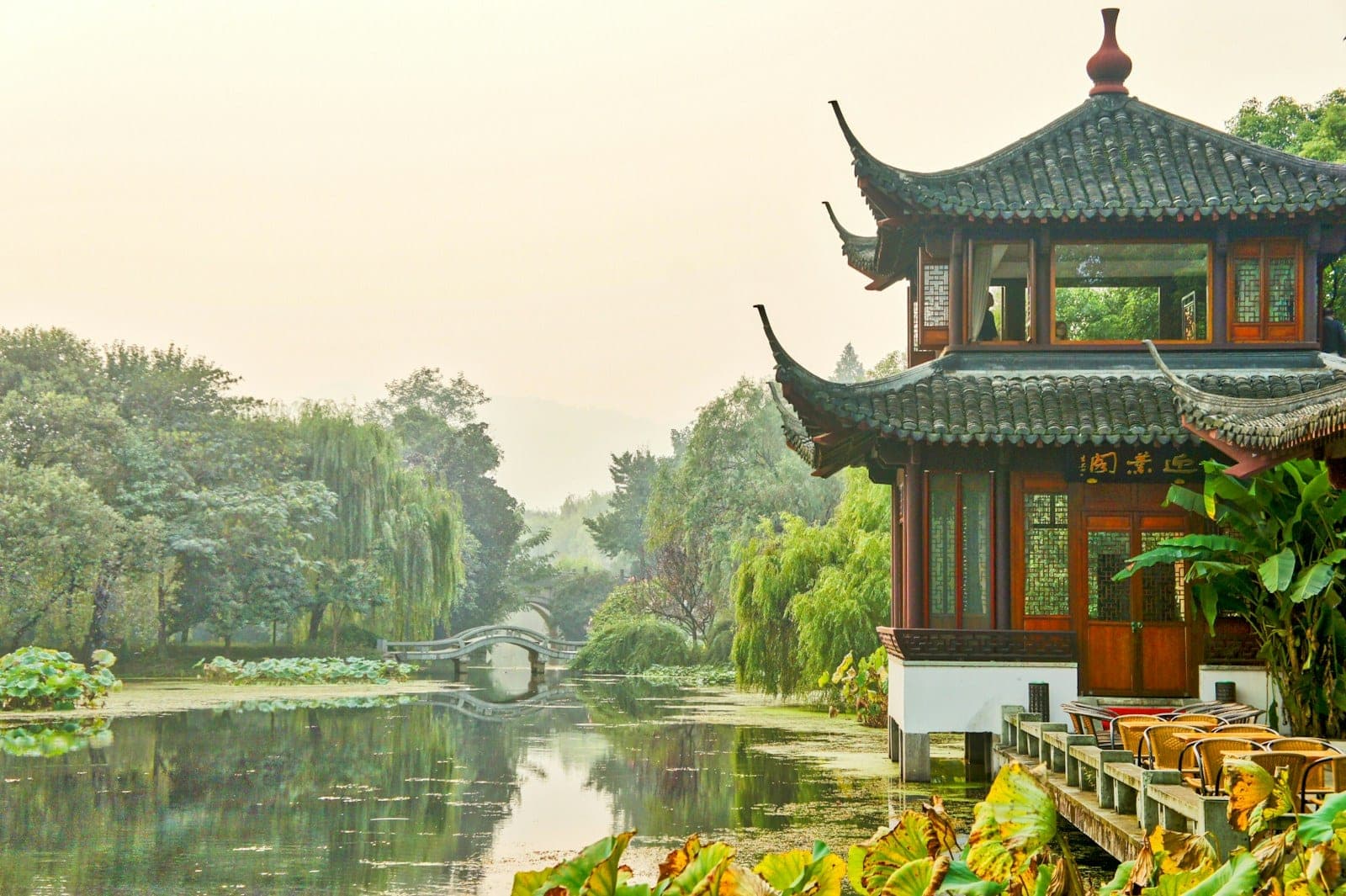 West Lake at dawn with the Broken Bridge in soft mist, Hangzhou