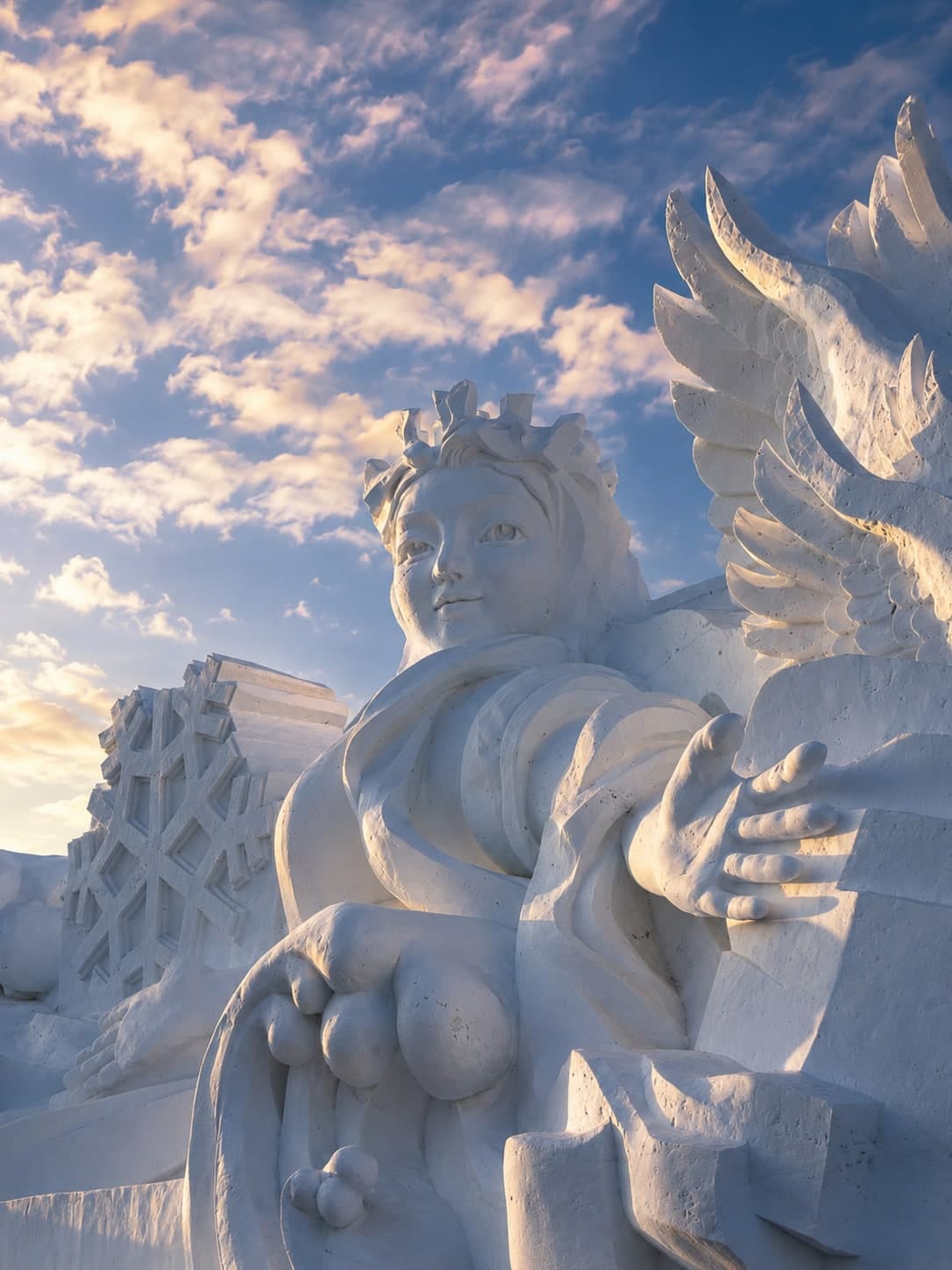 A large carved snow sculpture at the Sun Island Snow Sculpture Expo across the Songhua from Harbin, the fine detail held under flat winter light
