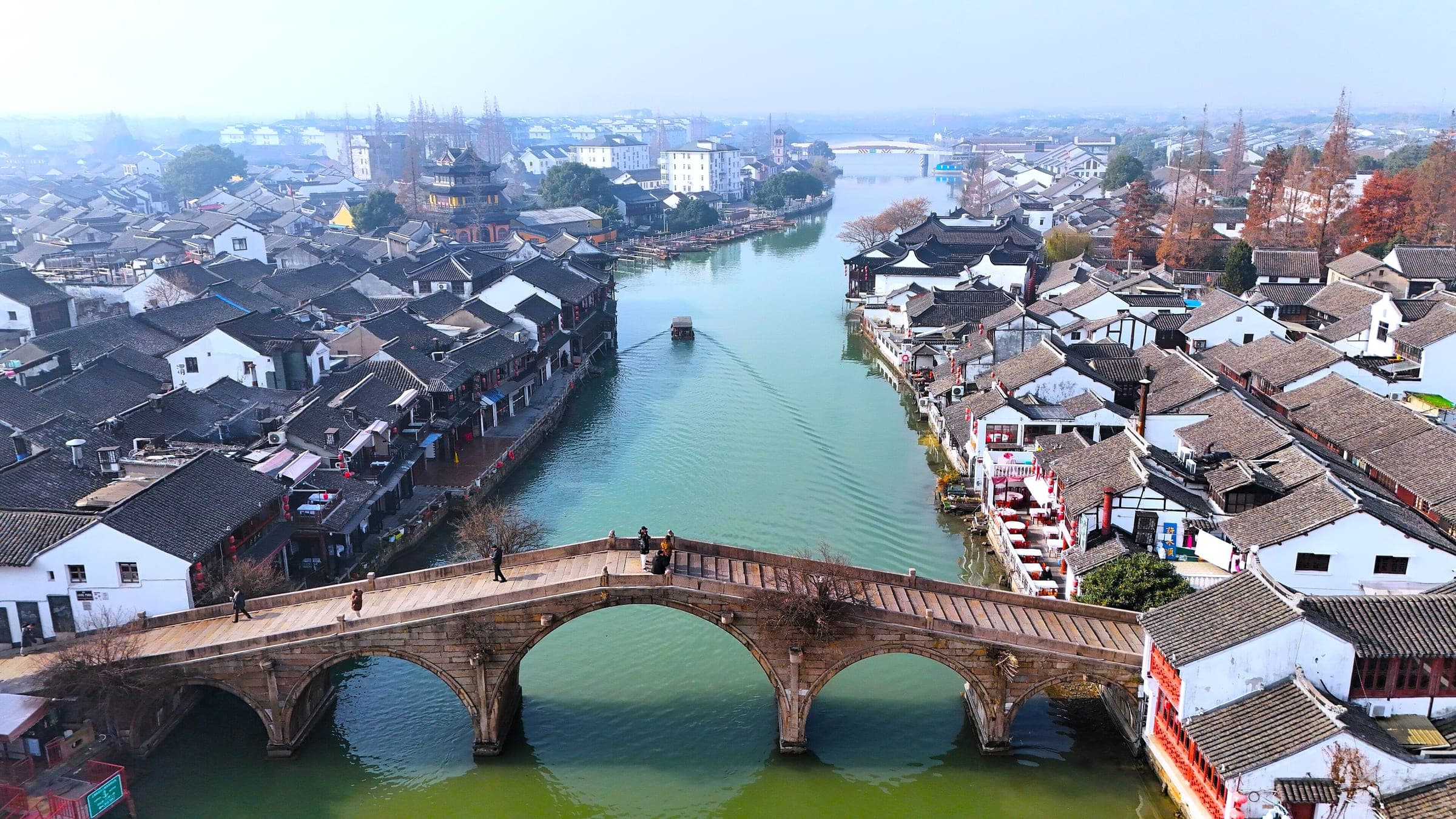 1 zhujiajiao 2023 aerial — drone view over the Fangsheng humpback bridge and the main canal