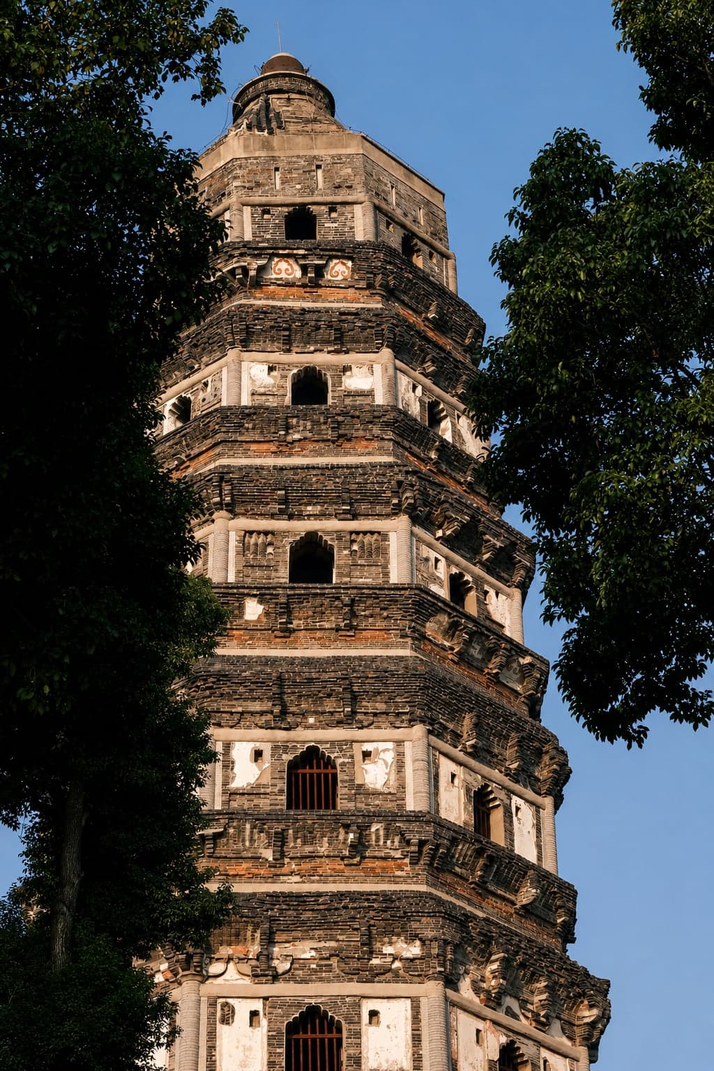 The leaning Yunyan Pagoda at the summit of Tiger Hill, built between 959 and 961 and tilted three degrees to the north-west