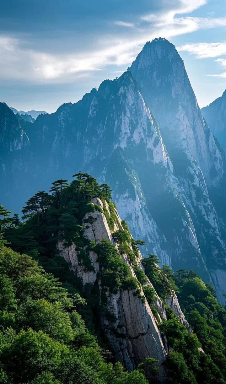 Mist clearing over Huashan's granite peaks at first light
