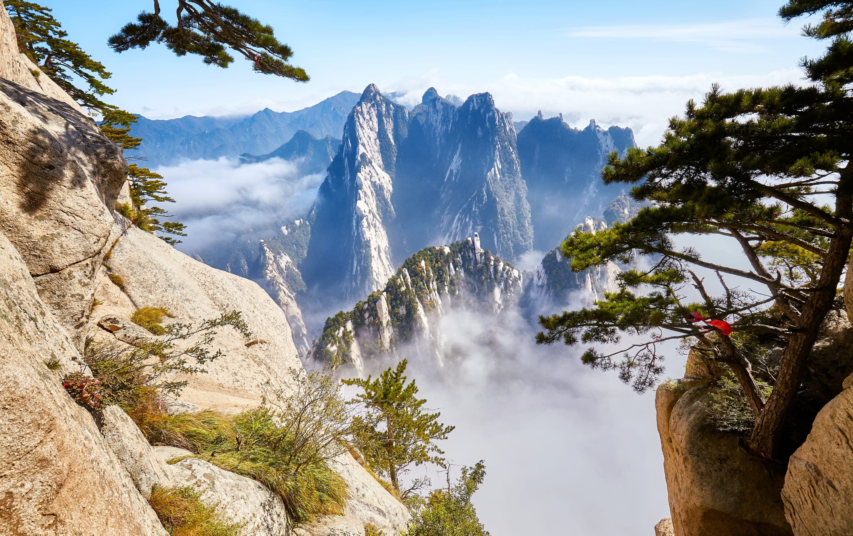 Mist clearing over Huashan's granite peaks at first light