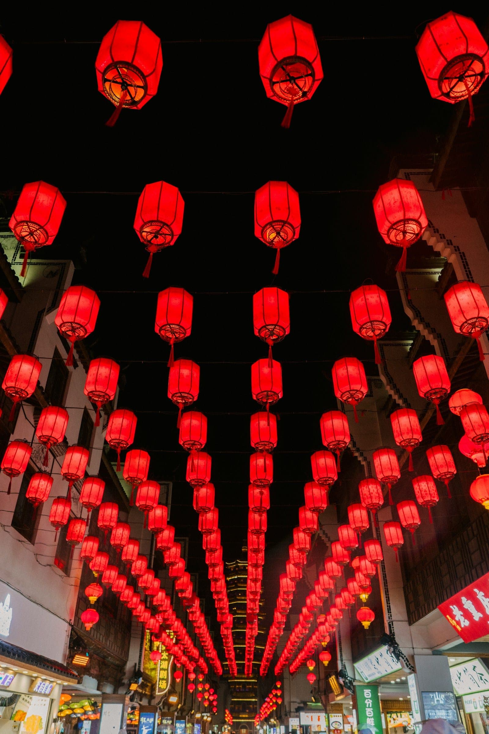 Lantern-lit lane in Chengdu's restored old quarter at dusk