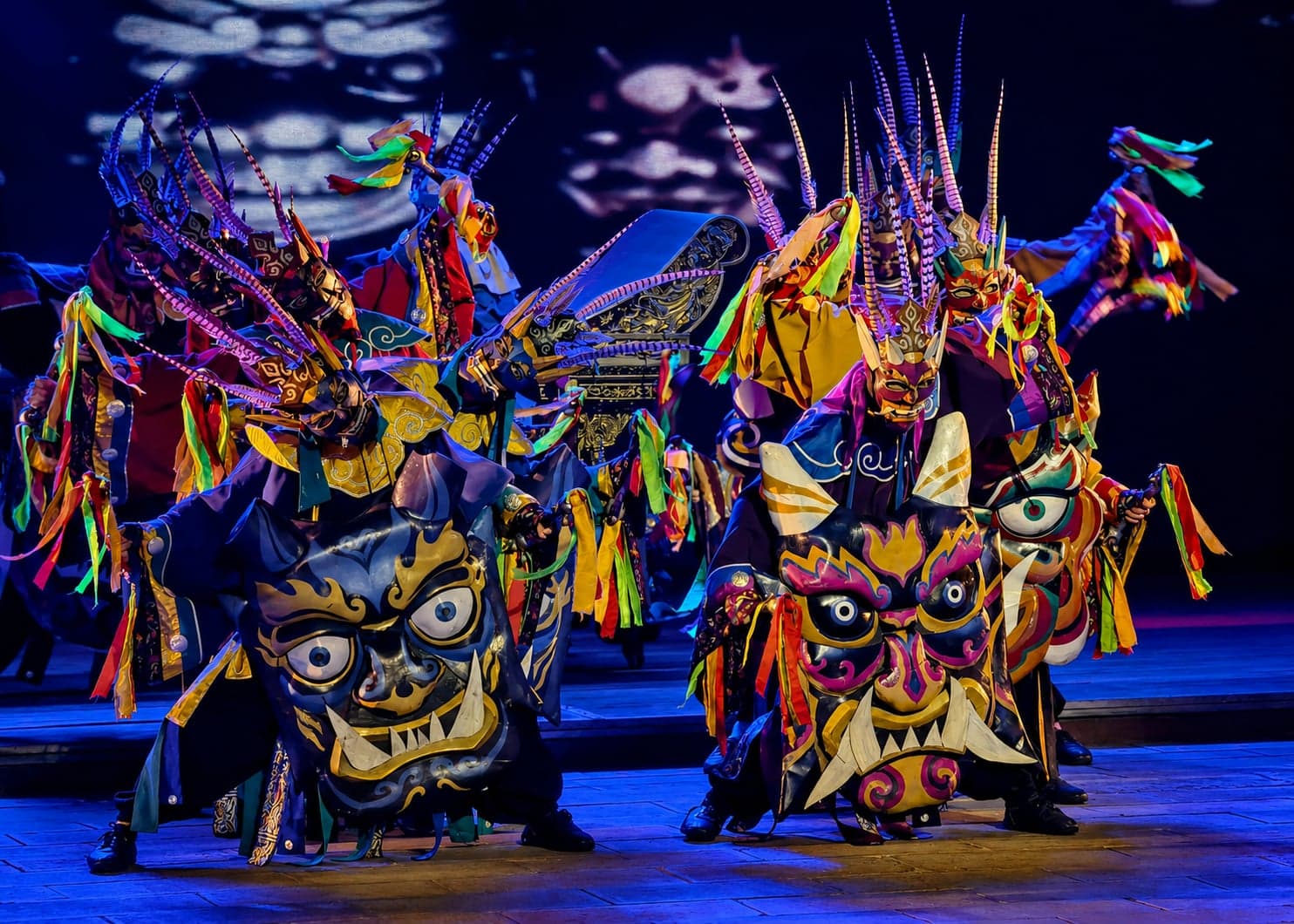 Tujia and Miao folk performers on the tiered stage of the Wulingyuan Grand Theatre during the Charm of Western Hunan production