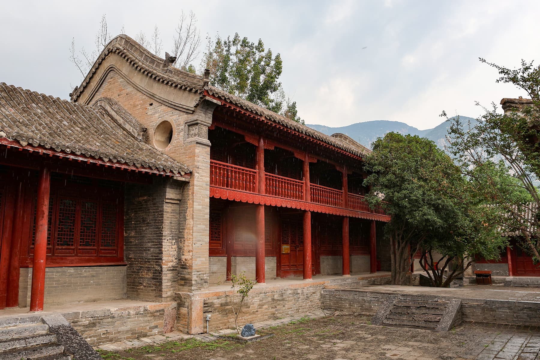 The General Cypress at Songyang Academy on Mount Songshan, the cypress-shaded Song-dynasty lecture courts behind