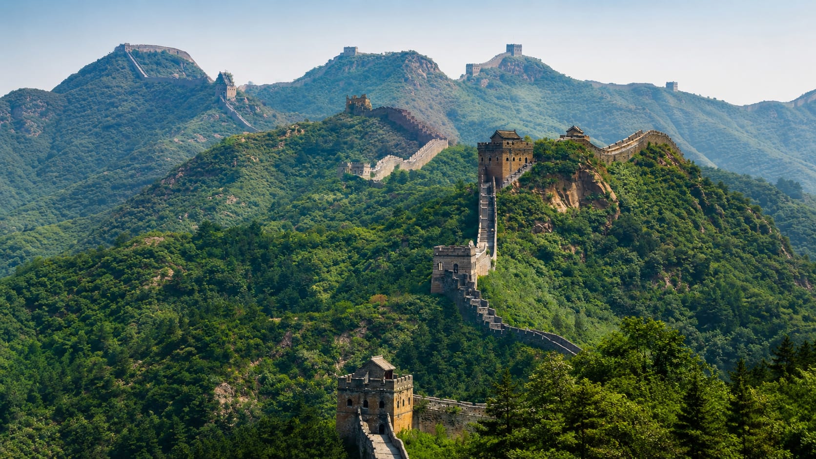 The Great Wall of China at Jinshanling, mist rising from the valleys